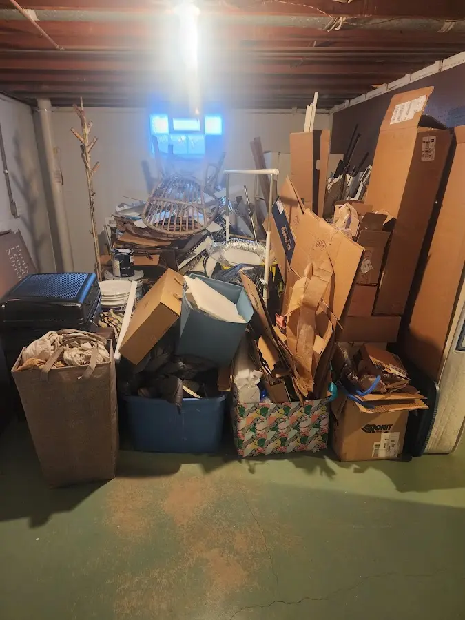 Roll-off dumpster container at job site for 4 Yard Dumpster Rental in Midway